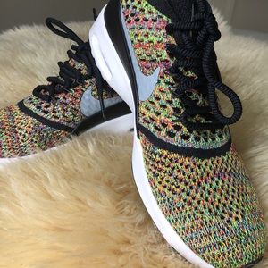 Nike women’s Juvenate woven; multi-colored